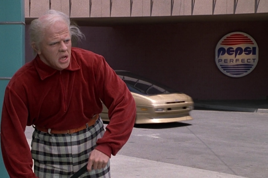 <p><strong>Figure 2.5</strong> As old 2015 Biff observes the hoverboard chase scene, we can see the Pepsi Perfect logo on outdoor signage across the street.</p>