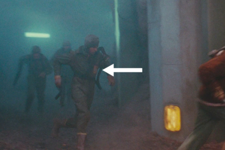 <p><strong>Figure 2.1</strong> Miners revolting against Federal Colonies, can be seen wearing the Pyramid Mines logo on patches.</p>