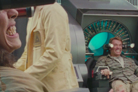 <p><strong>Figure 4.2</strong> A technician fulfilling one of his more unusual roles at Pyramid Mines—wiping minds against people’s will for an evil dictator. Note the patch on his yellow lab coat, displaying the Pyramid Mines logo.</p>