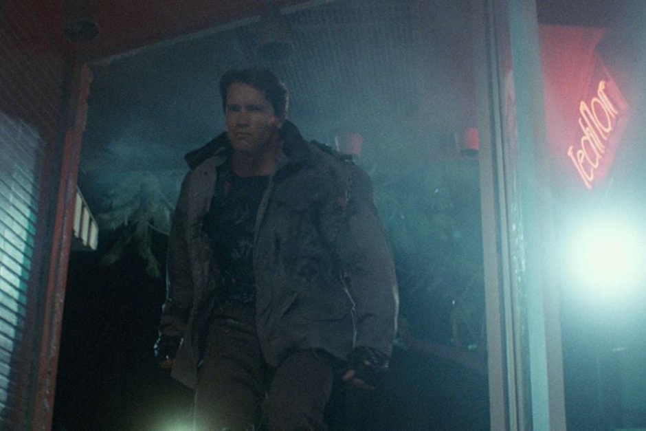 <p><strong>Figure 1.5</strong> After the Terminator recovers from falling through the club’s plate glass window, we see the Tech Noir neon again on the upper right.</p>