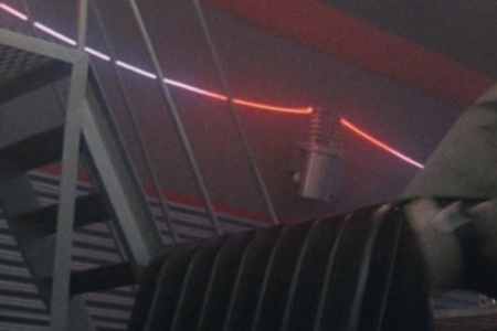 <p><strong>Figure 3.3</strong> A closer look reveals that the neon arcs bridge between power transformers, like you’d find on a utility pole.
</p>