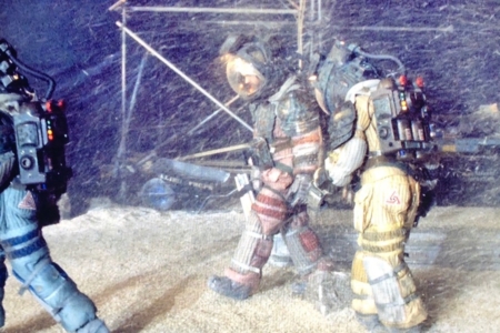 <p><strong>Figure 1.2</strong> This production photo offers a good view of Kane’s UK-7 patch, as it was worn on his space suit (right). Source: Production Image Gallery, <em>The Alien Anthology</em> </p>