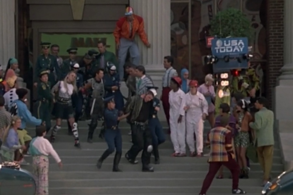 <p><strong>Figure 1.2</strong> As Griff and his gang are being arrested, we see the <em>USA Today</em> logo on a hovering news camera drone that is capturing the event.</p>